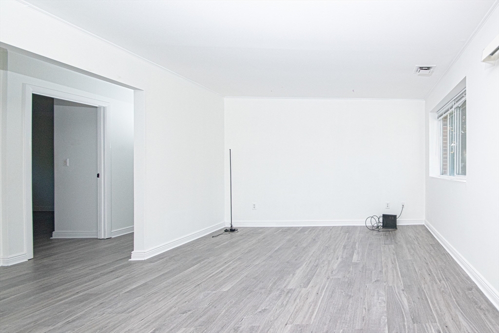 41 Bayberry Drive, Unit 4 Sharon, MA 02067 - Photo 22 of 27 a view of empty room with wooden floor