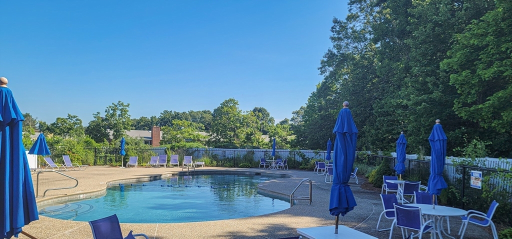 41 Bayberry Drive, Unit 4 Sharon, MA 02067 - Photo 26 of 27 a view of a swimming pool with a patio