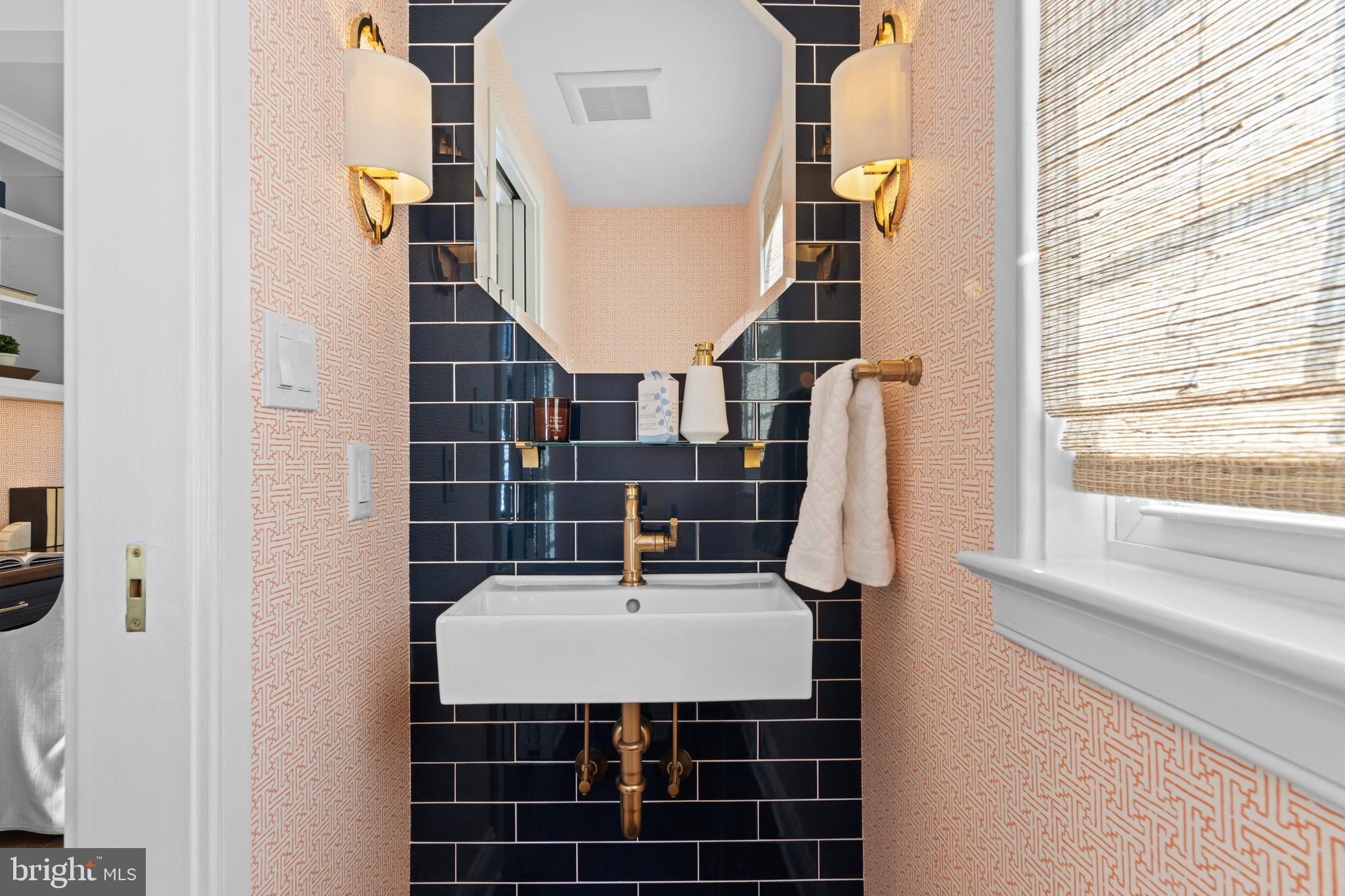 116 Morningside Circle Wayne, PA 19087 - Photo 19 of 37 a bathroom with a sink and a mirror