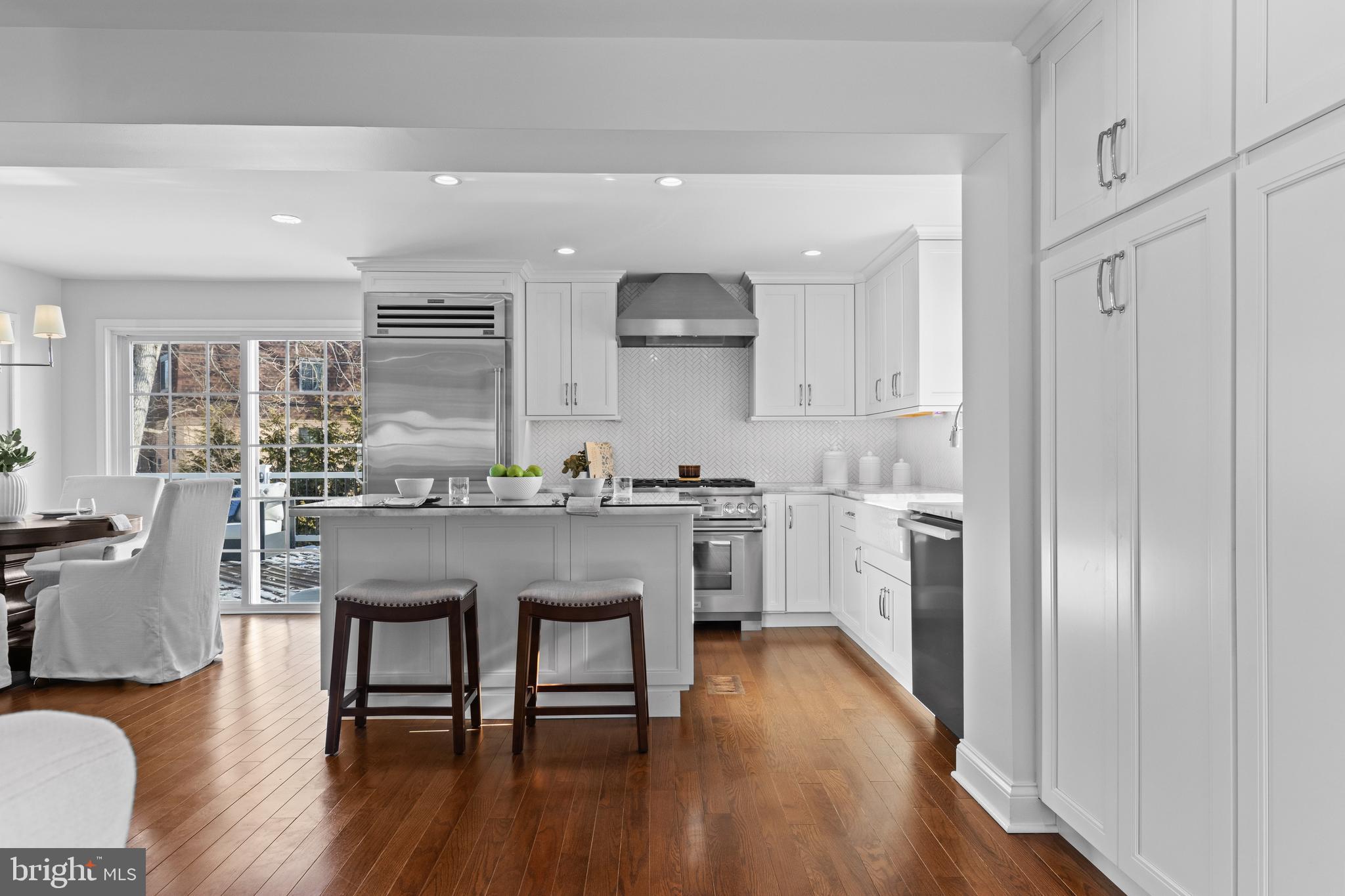 116 Morningside Circle Wayne, PA 19087 - Photo 5 of 37 a kitchen with a sink cabinets and wooden floor