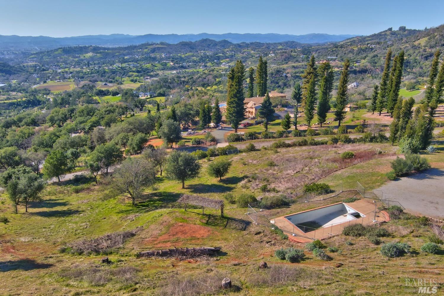 a view of a town with mountains