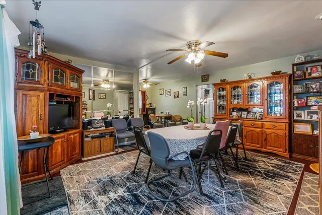 a view of a dining room with furniture
