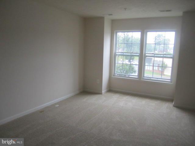 9613 Bird River Road Baltimore, MD 21220 - Photo 18 of 20 an empty room with a window