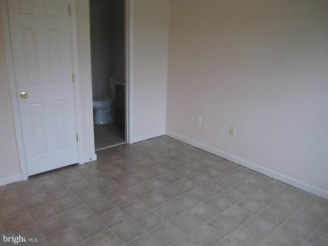9613 Bird River Road Baltimore, MD 21220 - Photo 4 of 20 a view of an empty room and entryway
