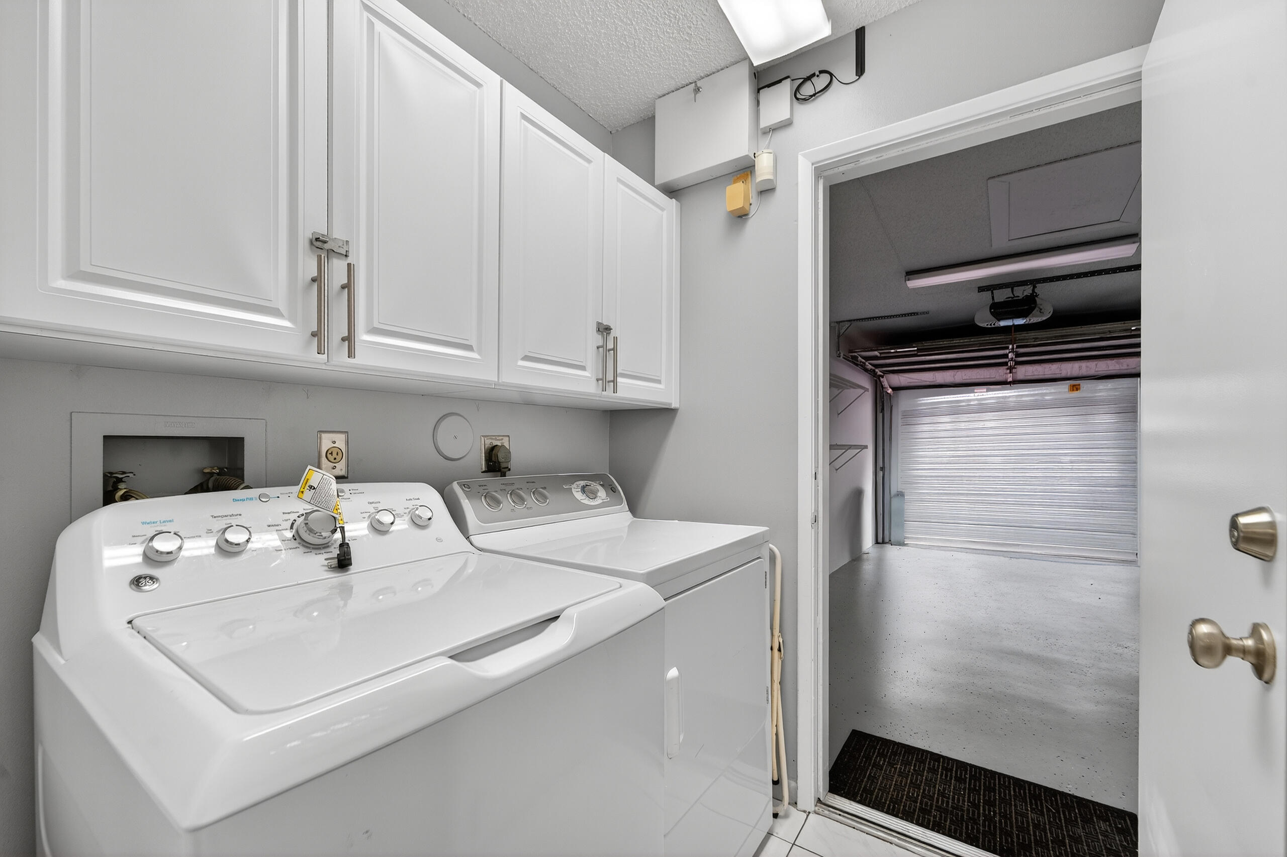 6065 Sunny Manor Court Delray Beach, FL 33484 - Photo 25 of 58 a utility room with washer and dryer