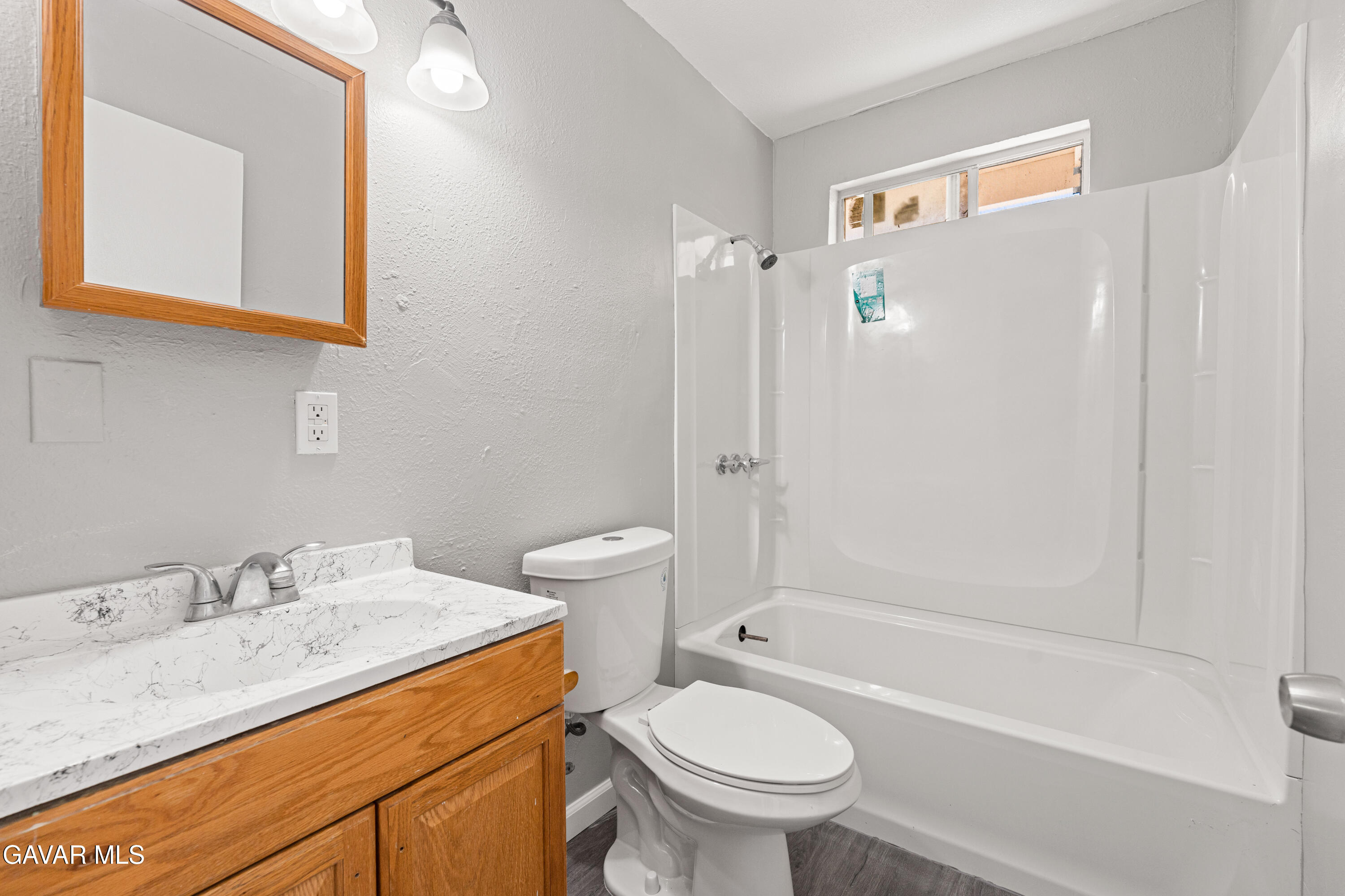 38559 4th Street East Palmdale, CA 93550 - Photo 2 of 5 a bathroom with a sink toilet and shower