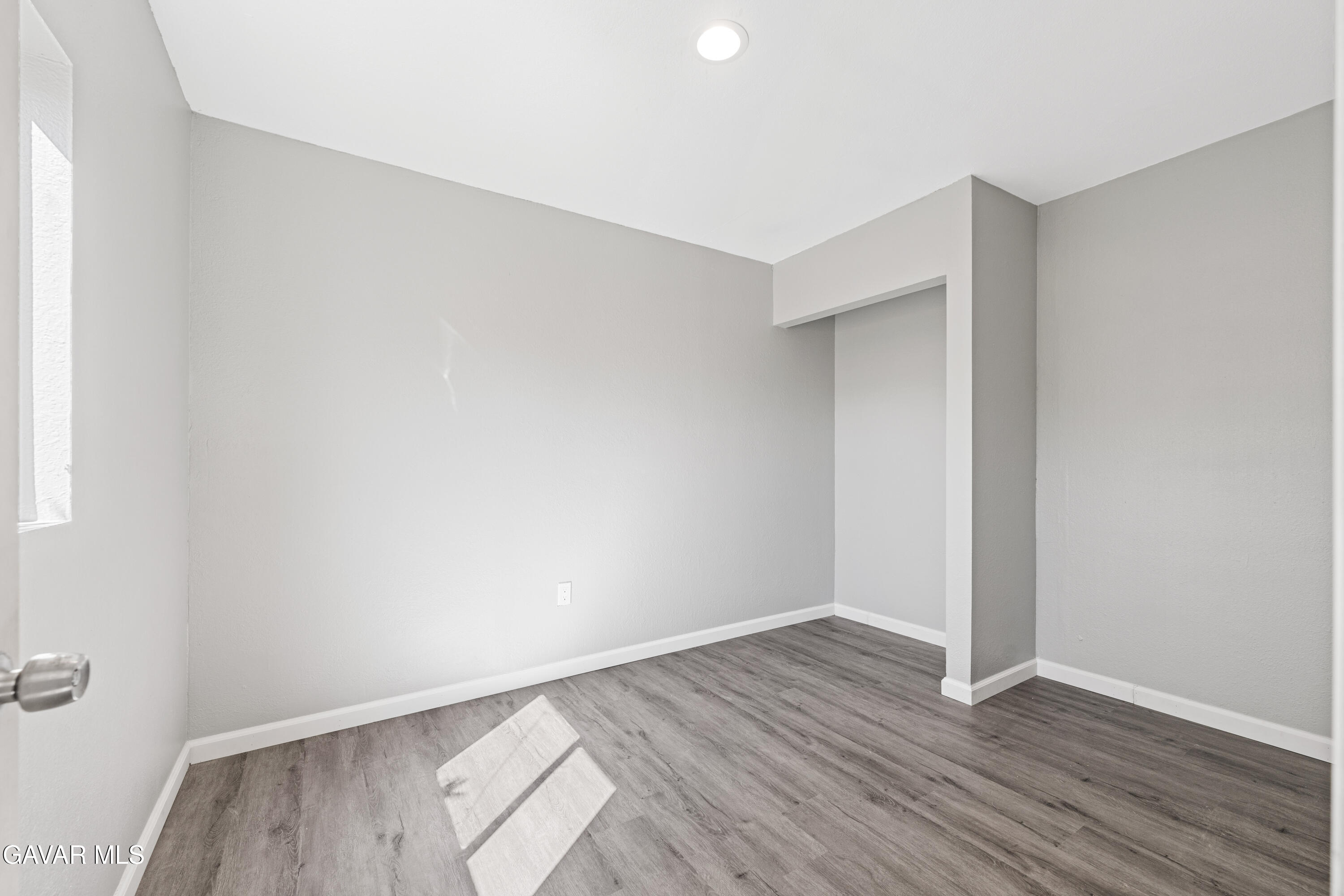 38559 4th Street East Palmdale, CA 93550 - Photo 5 of 5 an empty room with wooden floor