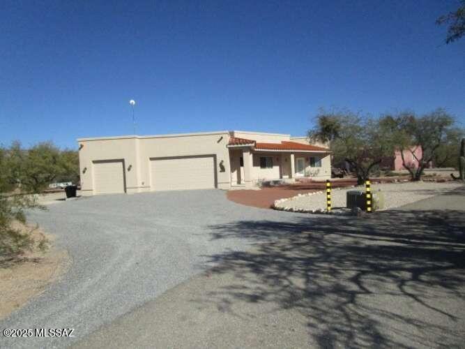 11553 East Tanque Verde Road Tucson, AZ 85749 - Photo 3 of 16 a view of a house with a outdoor space