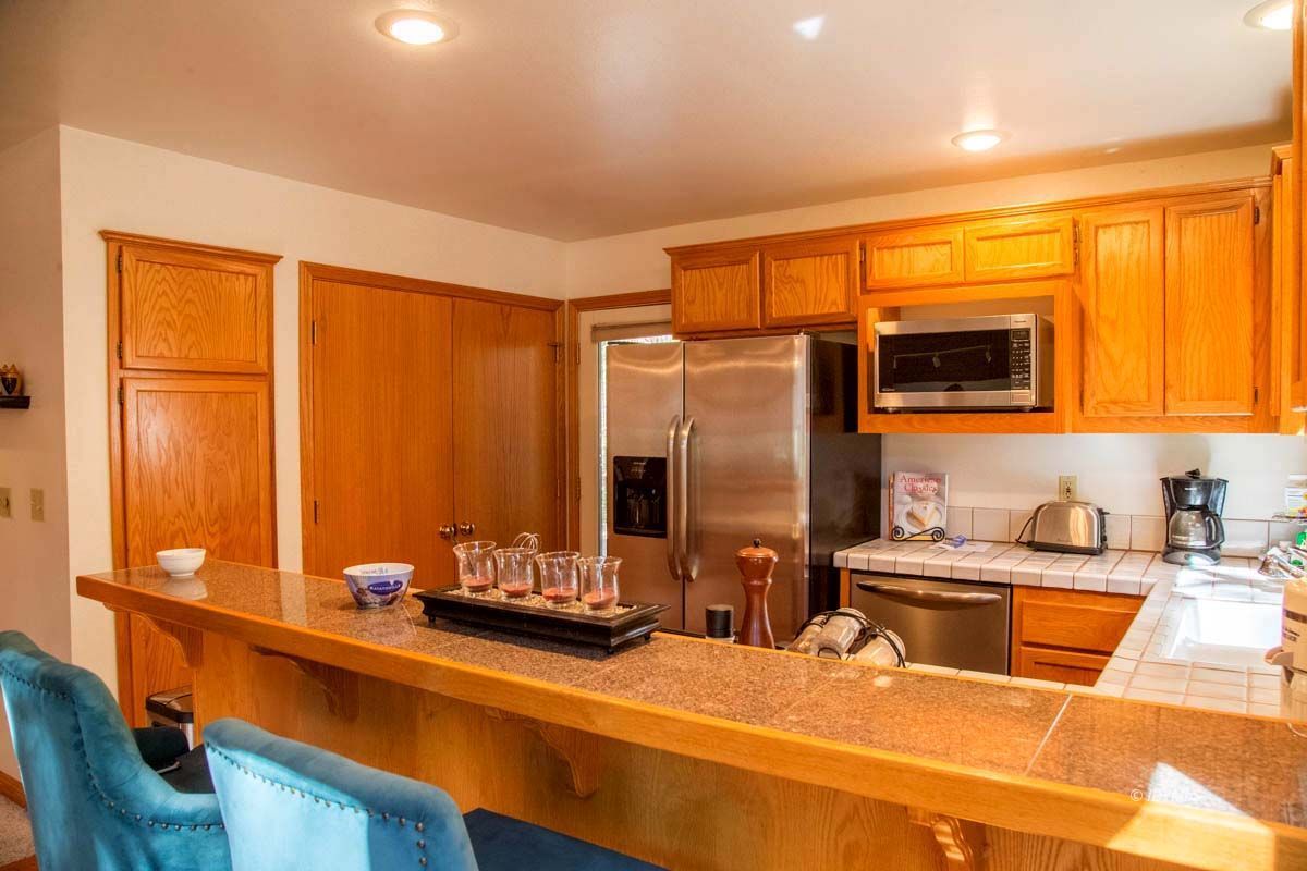 26540 Saunders Meadow Road Idyllwild, CA 92549 - Photo 11 of 34 a room with a large window and furniture
