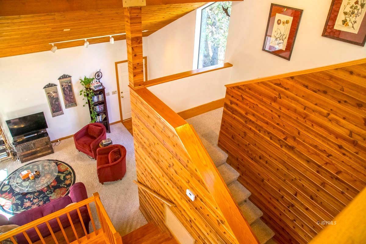 26540 Saunders Meadow Road Idyllwild, CA 92549 - Photo 28 of 34 a blue bed sitting next to a blue wall