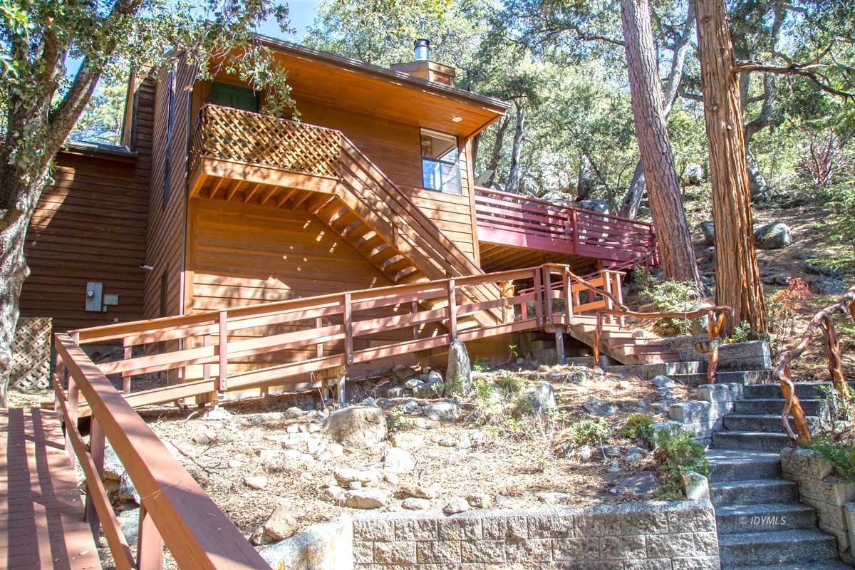 26540 Saunders Meadow Road Idyllwild, CA 92549 - Photo 3 of 34 a view of a pathway with a tree
