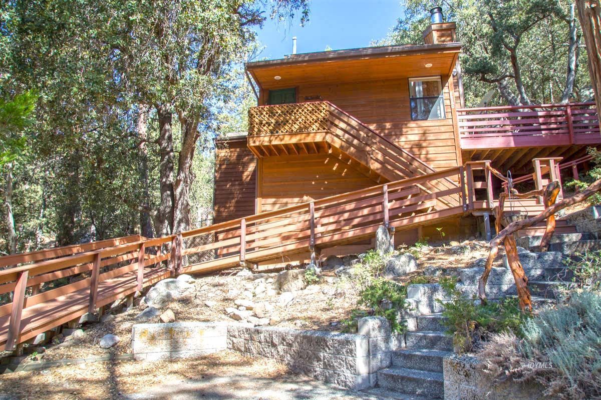 26540 Saunders Meadow Road Idyllwild, CA 92549 - Photo 34 of 34 a view of a backyard with a tree