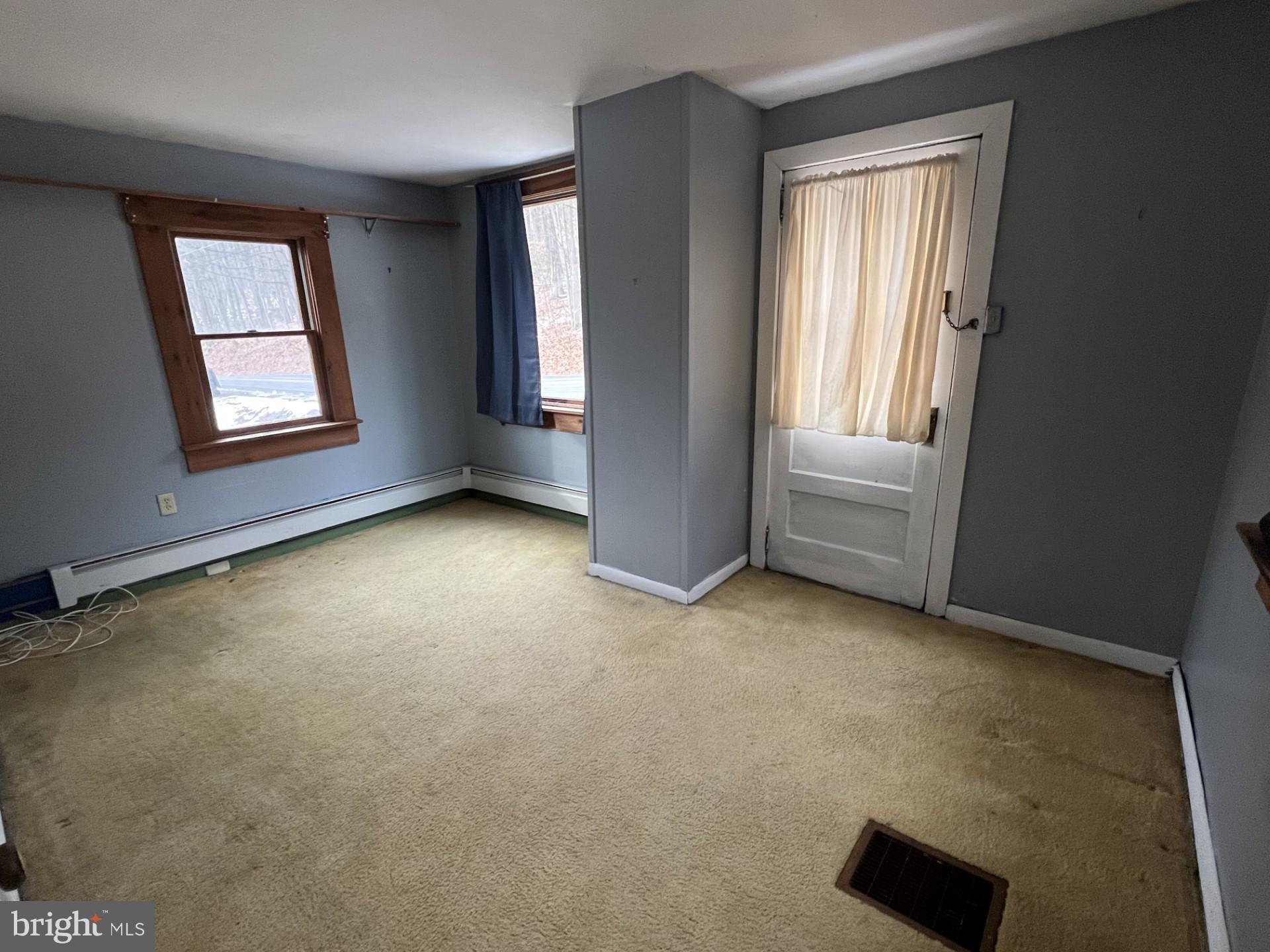 511 Church Lane Road Reading, PA 19606 - Photo 12 of 17 an empty room with windows