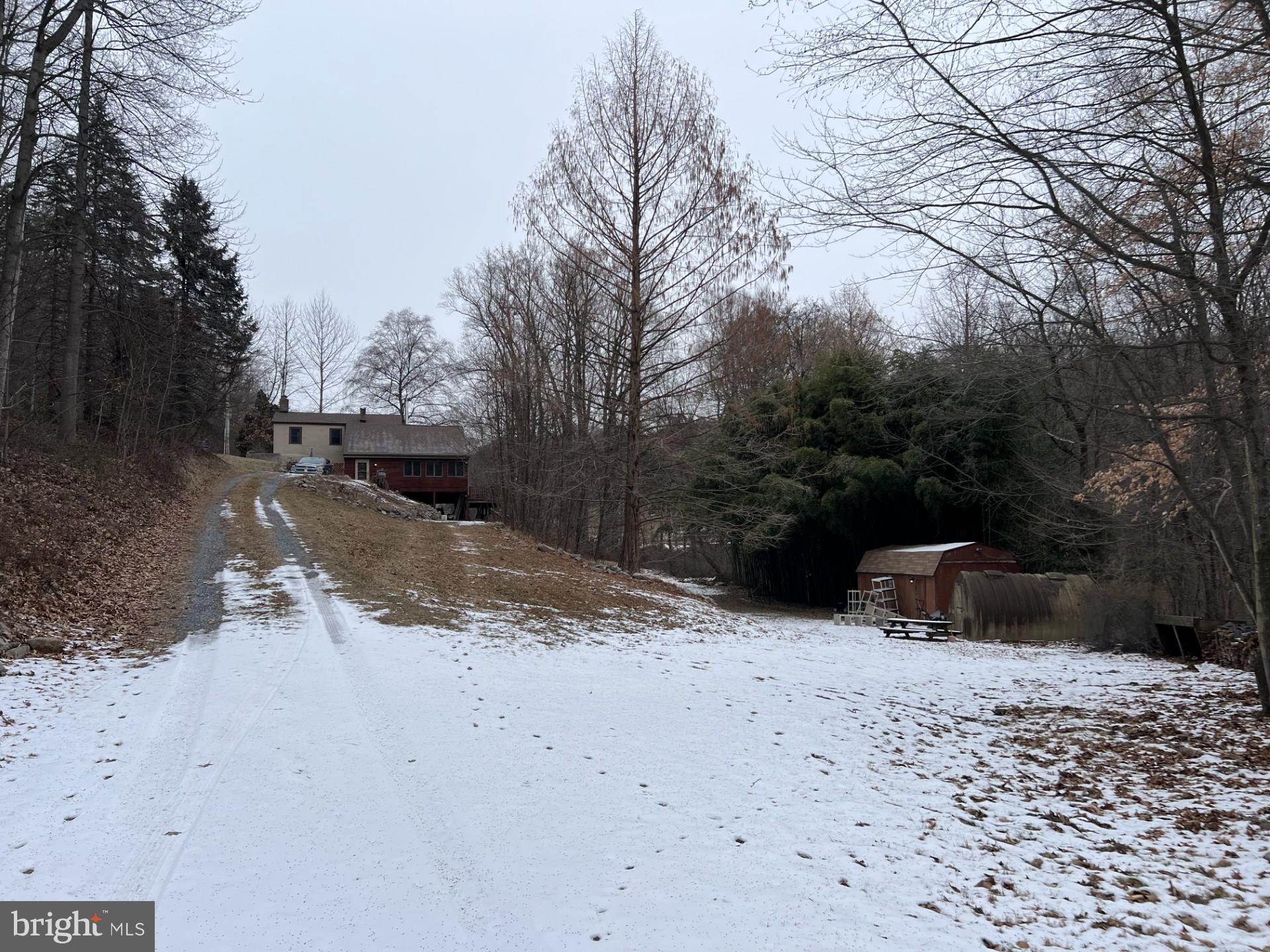 511 Church Lane Road Reading, PA 19606 - Photo 17 of 17 a view of a yard covered in snow