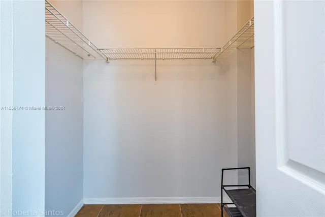 a bathroom with a sink mirror toilet and bathtub