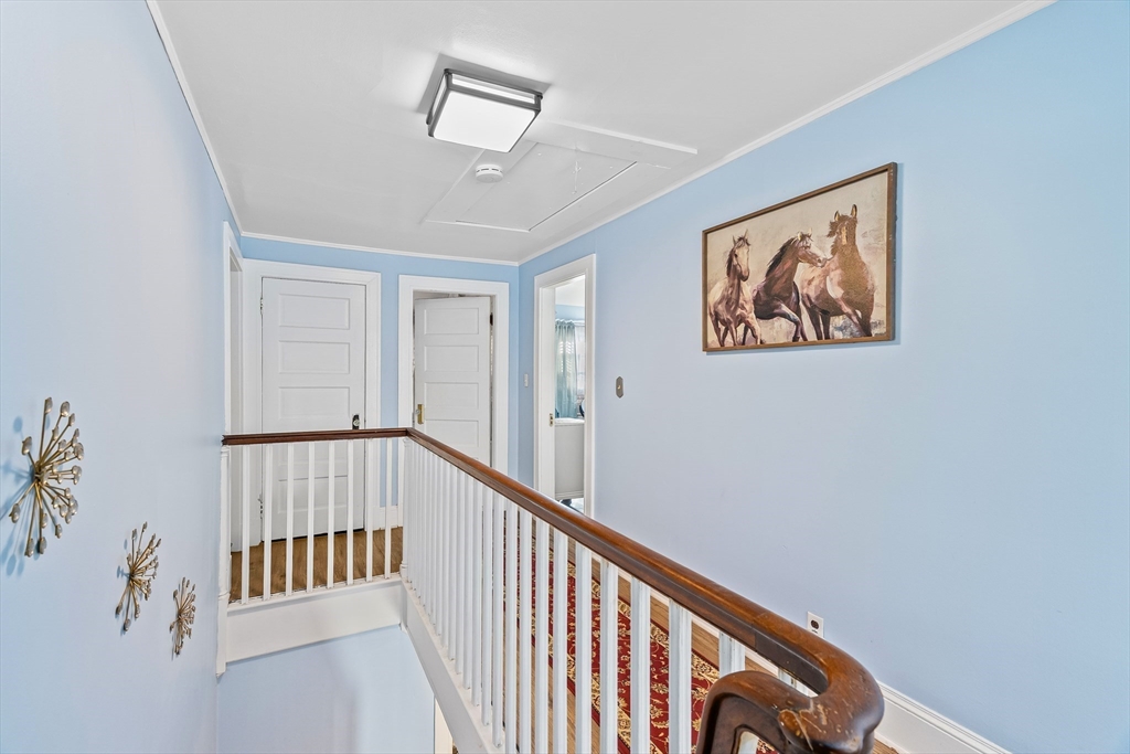 28 Maple Street Southbridge, MA 01550 - Photo 14 of 25 a view of a hallway with workspace