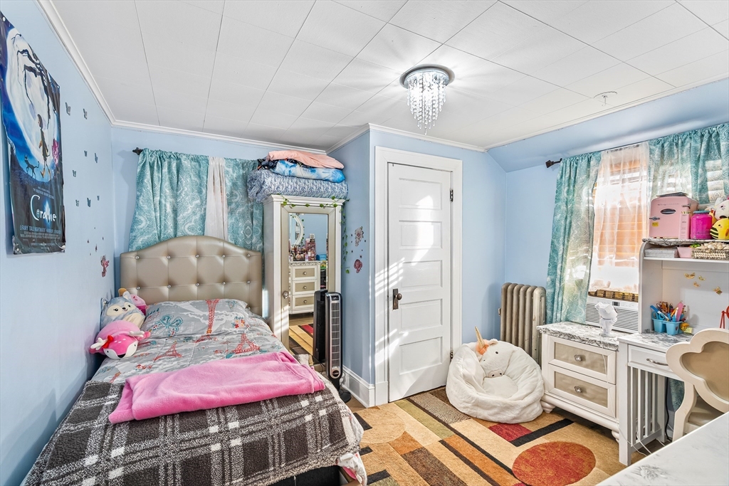 28 Maple Street Southbridge, MA 01550 - Photo 18 of 25 a bedroom with furniture and a window