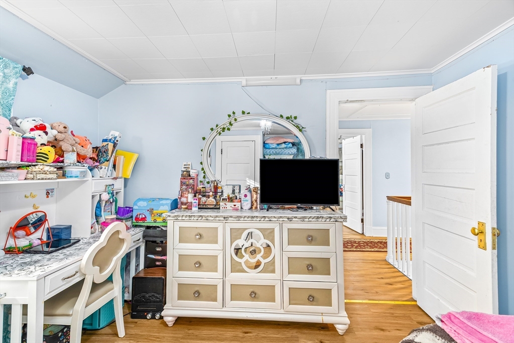 28 Maple Street Southbridge, MA 01550 - Photo 19 of 25 a view of a workspace with furniture and wooden floor