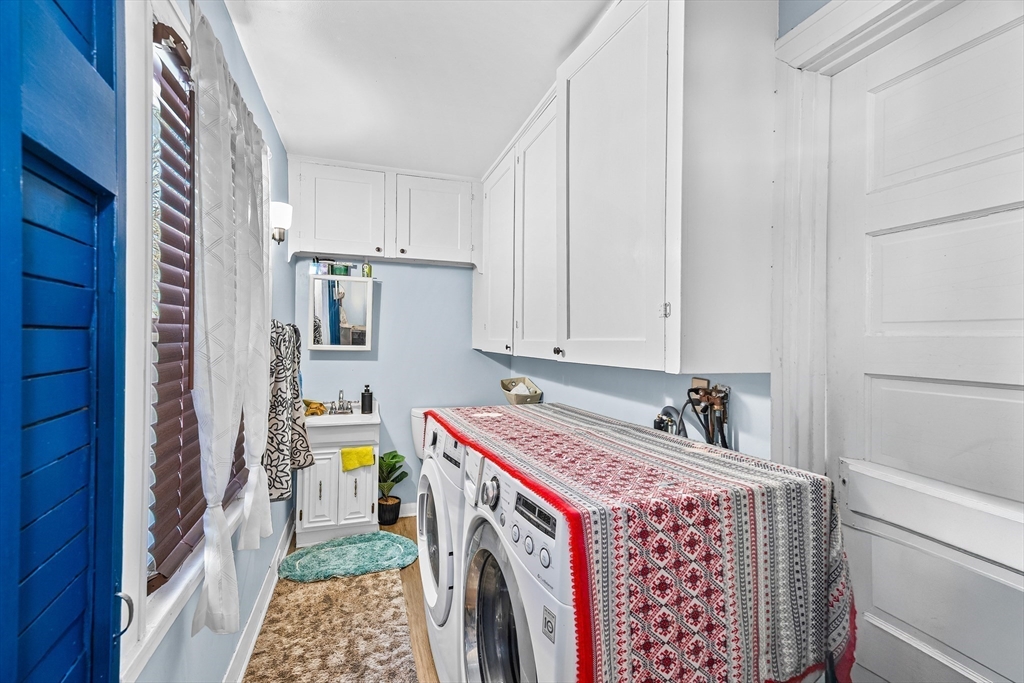 28 Maple Street Southbridge, MA 01550 - Photo 22 of 25 a utility room with dryer and washer