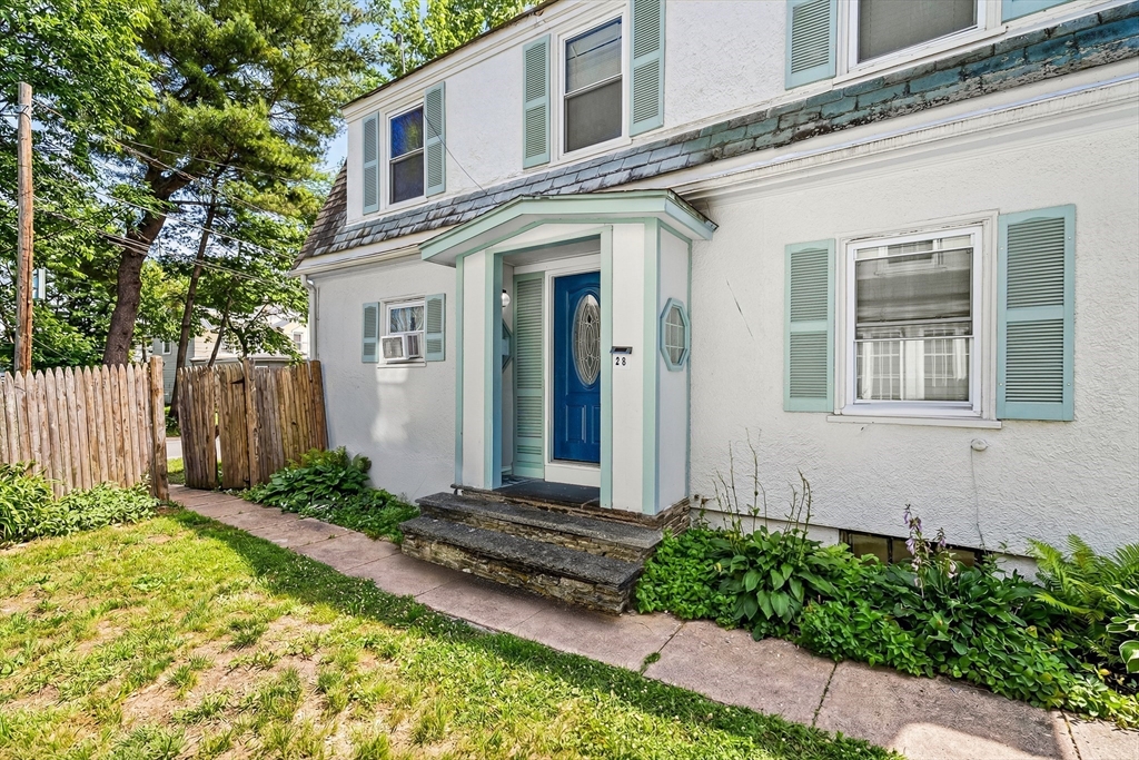 28 Maple Street Southbridge, MA 01550 - Photo 24 of 25 a front view of a house with a yard