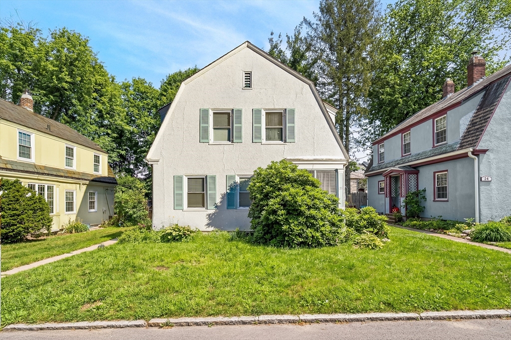 28 Maple Street Southbridge, MA 01550 - Photo 25 of 25 a view of a white house next to a yard