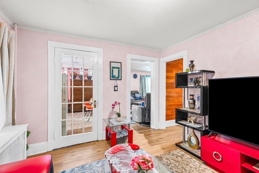 28 Maple Street Southbridge, MA 01550 - Photo 6 of 25 a bedroom with furniture and a flat screen tv