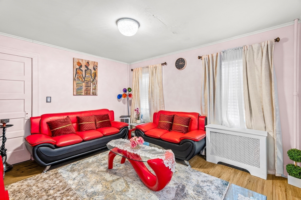 28 Maple Street Southbridge, MA 01550 - Photo 7 of 25 a bedroom with furniture and a couch