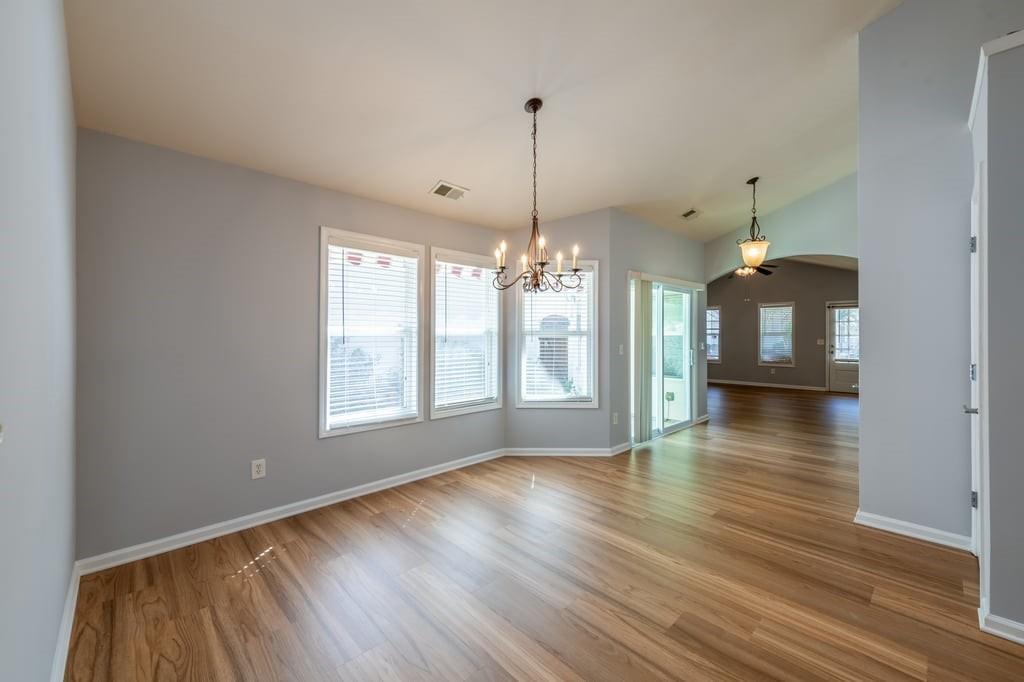 150 Jaime Drive Canton, GA 30114 - Photo 11 of 34 a view of a room window and wooden floor