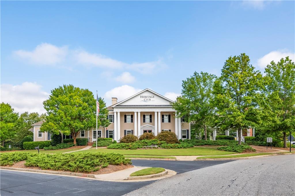 150 Jaime Drive Canton, GA 30114 - Photo 27 of 34 a front view of a house with a yard