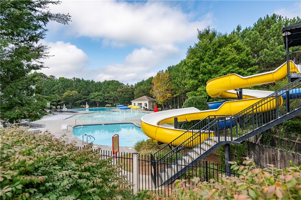 150 Jaime Drive Canton, GA 30114 - Photo 29 of 34 a view of a backyard with swimming pool and sitting area