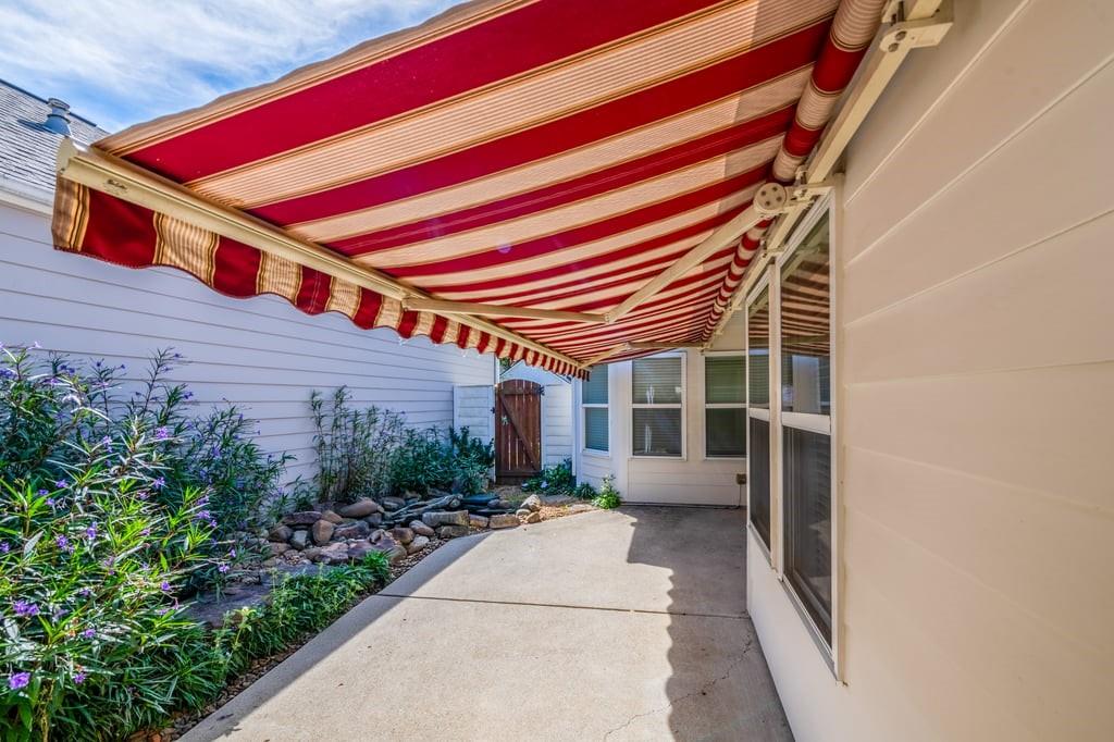 150 Jaime Drive Canton, GA 30114 - Photo 3 of 34 a front view of a house with garden