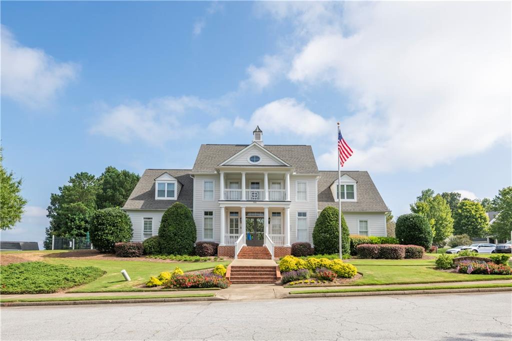 150 Jaime Drive Canton, GA 30114 - Photo 31 of 34 a front view of a house with a yard