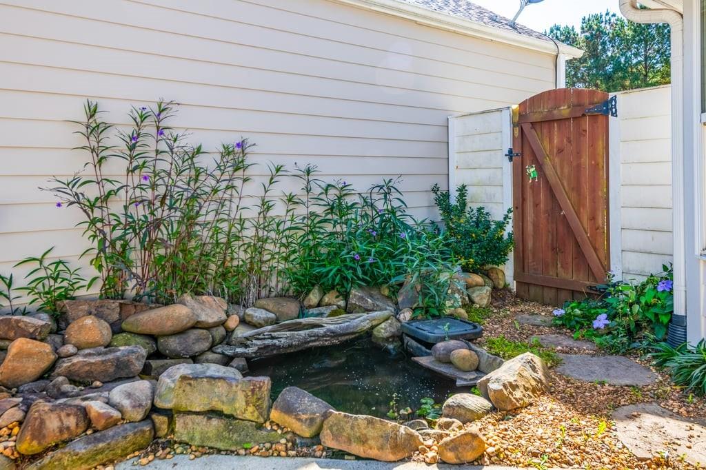 150 Jaime Drive Canton, GA 30114 - Photo 5 of 34 a backyard of a house with lots of green space