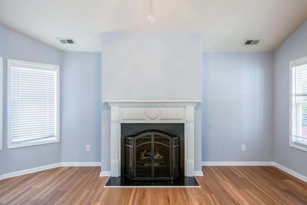 150 Jaime Drive Canton, GA 30114 - Photo 9 of 34 a view of a livingroom with a fireplace and window