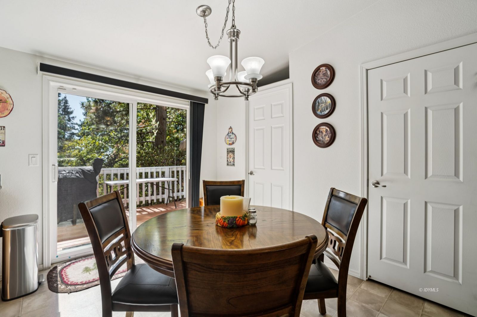 25001 Rim Rock Road Idyllwild, CA 92549 - Photo 14 of 50 a view of a dining room with furniture window and wooden floor
