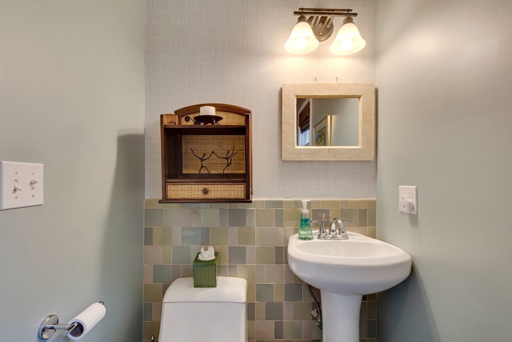 2 Deane Avenue Winthrop, MA 02152 - Photo 17 of 42 a bathroom with a sink mirror and toilet