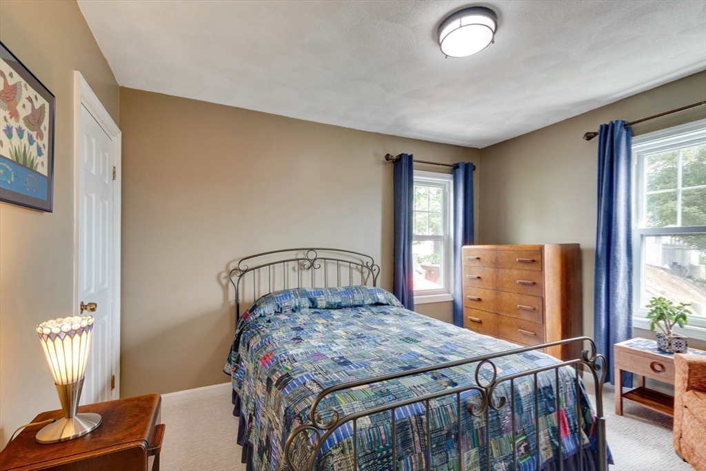 2 Deane Avenue Winthrop, MA 02152 - Photo 22 of 42 a bedroom with a bed and a window