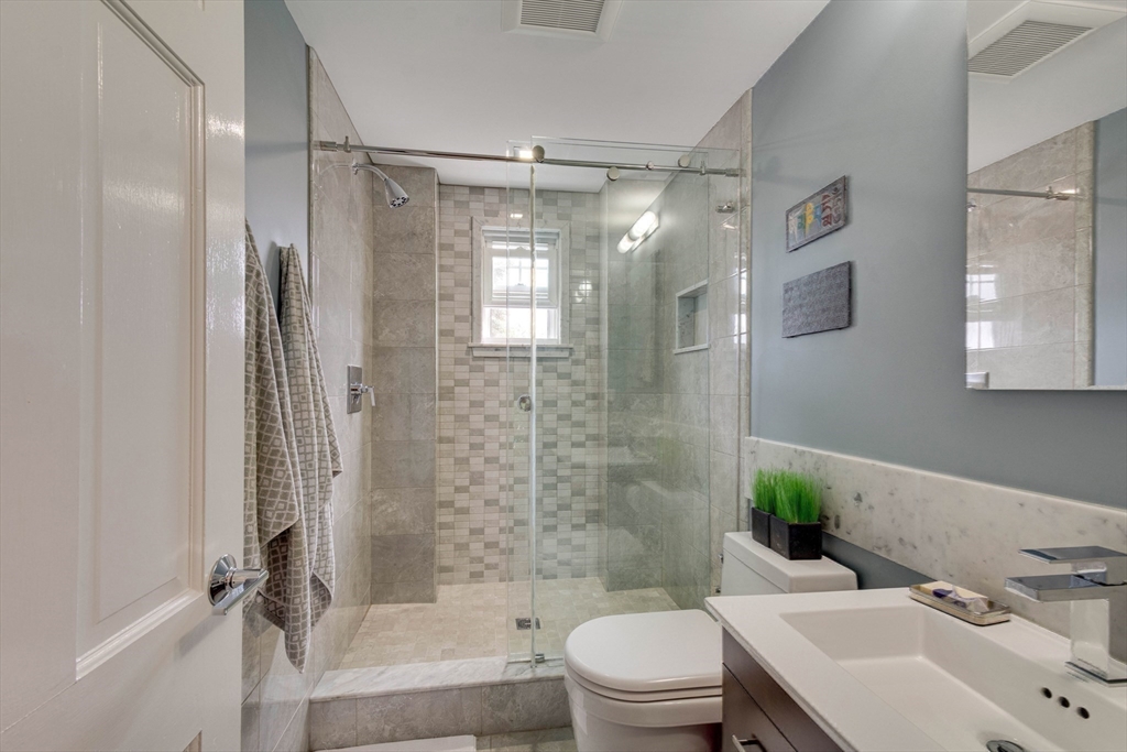 2 Deane Avenue Winthrop, MA 02152 - Photo 24 of 42 a bathroom with a sink toilet and shower