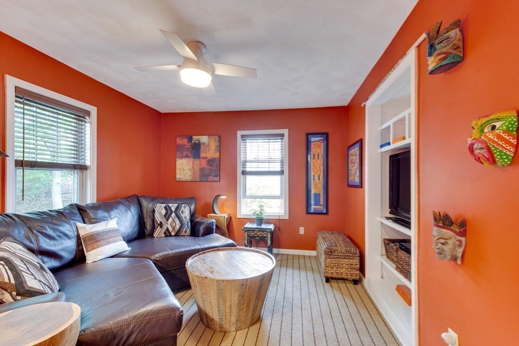 2 Deane Avenue Winthrop, MA 02152 - Photo 25 of 42 a living room with furniture and a large window