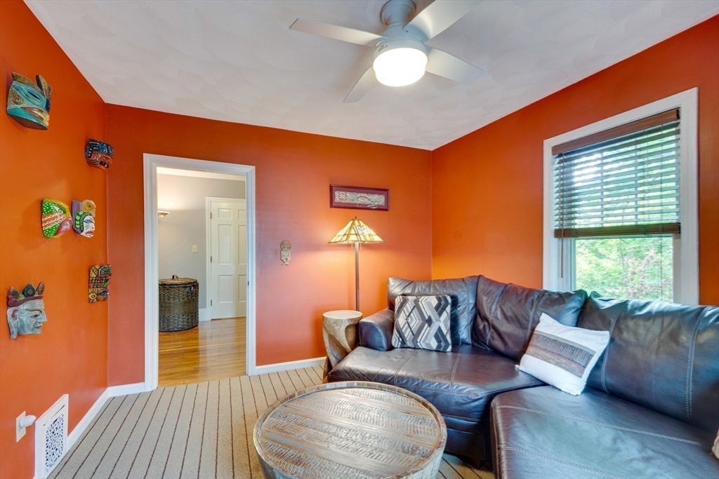 2 Deane Avenue Winthrop, MA 02152 - Photo 26 of 42 a living room with furniture and a large window