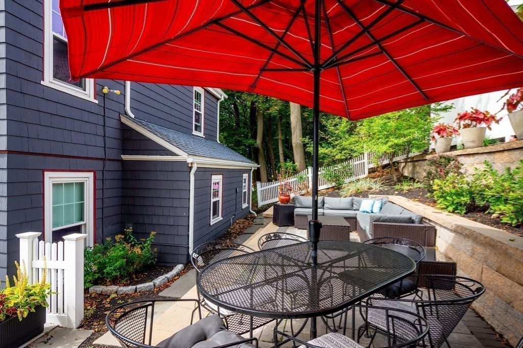 2 Deane Avenue Winthrop, MA 02152 - Photo 33 of 42 a view of a backyard with sitting area