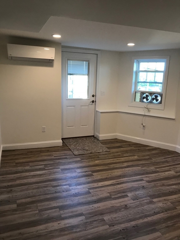 2 Deane Avenue Winthrop, MA 02152 - Photo 41 of 42 wooden floor in an empty room with a window