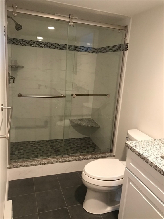 2 Deane Avenue Winthrop, MA 02152 - Photo 42 of 42 a bathroom with a toilet and a shower