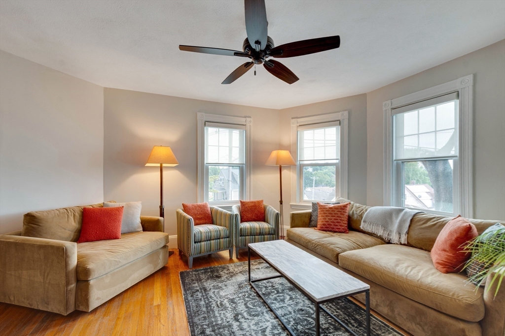 2 Deane Avenue Winthrop, MA 02152 - Photo 8 of 42 a living room with furniture and a large window