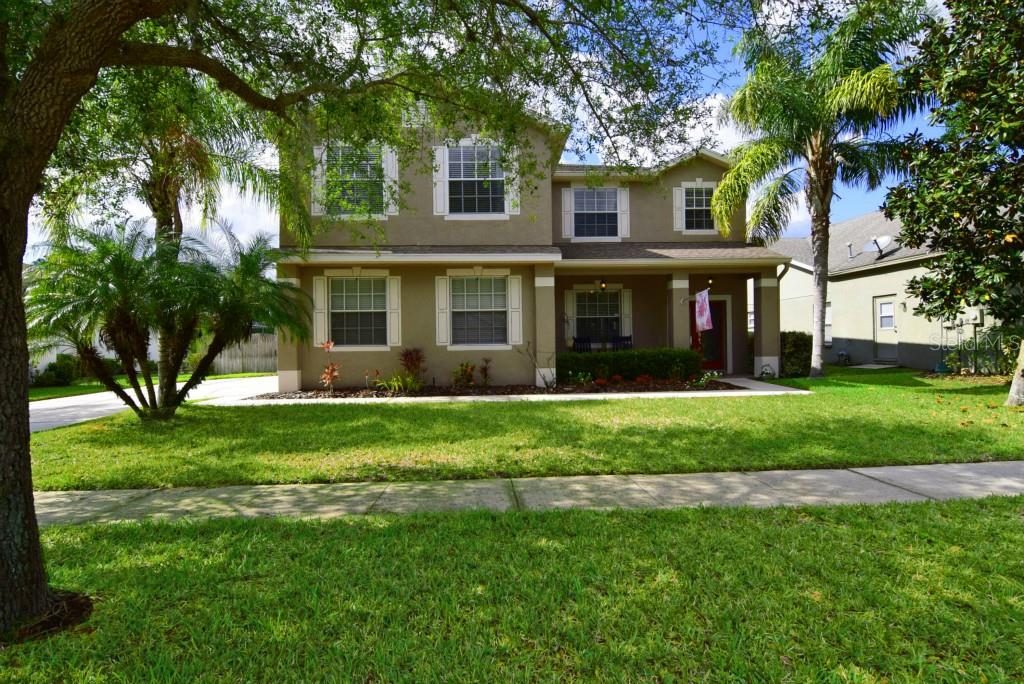 17120 Falconridge Road Lithia, FL 33547 - Photo 1 of 1 front view of a house with a yard
