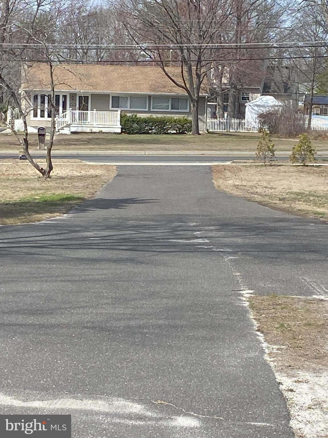 850 Jarvis Road Sicklerville, NJ 08081 - Photo 8 of 9 a view of residential houses with yard and road
