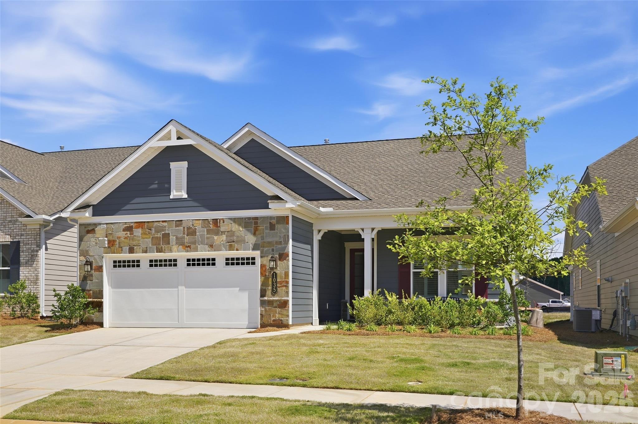 1035 Rabbit Hl Lane Monroe, NC 28110 - Photo 2 of 39 a front view of a house with a yard