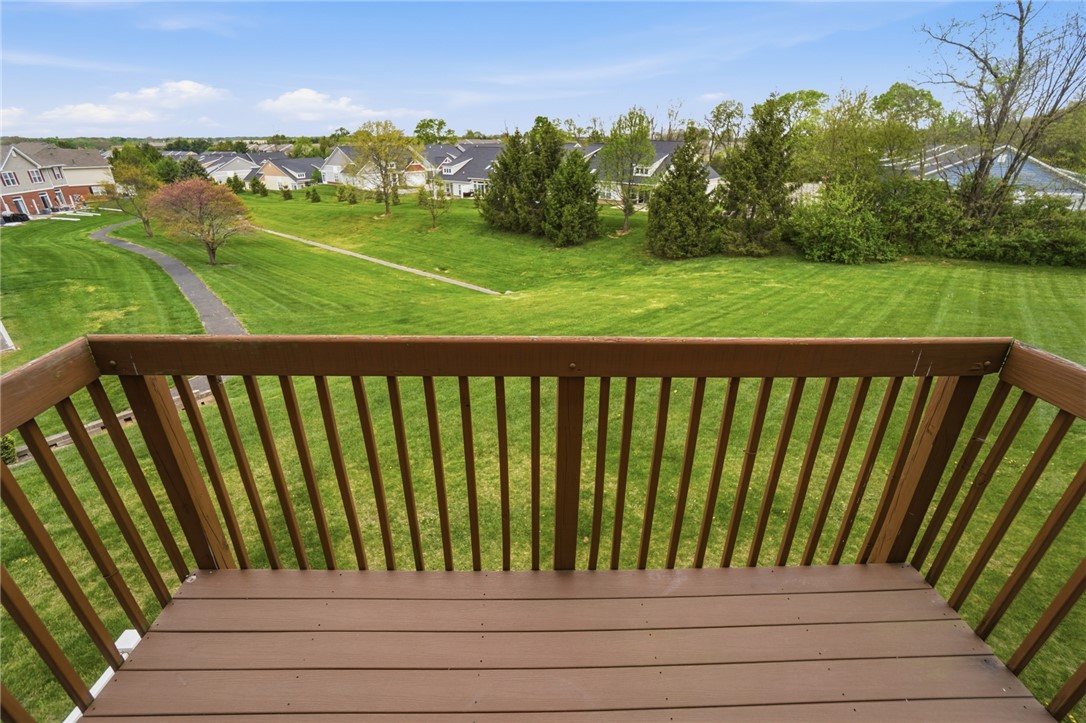 4324 Straight Arrow Road Dayton, OH 45430 - Photo 16 of 40 Enjoy expansive views of the manicured greenspace and peaceful community from this elevated outdoor space.