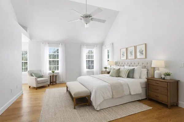 a bedroom with a bed and furniture