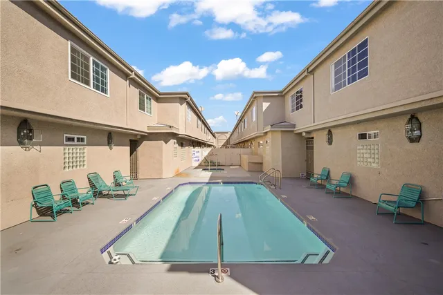 a aerial view of a house with a yard